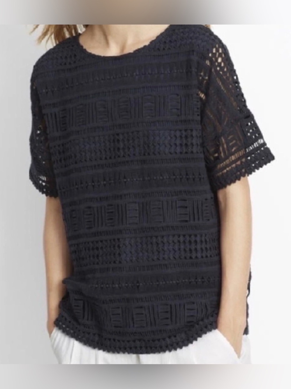 Vince Geometric Open-Work Crochet Pointelle Cotton Top in a deep navy blue.